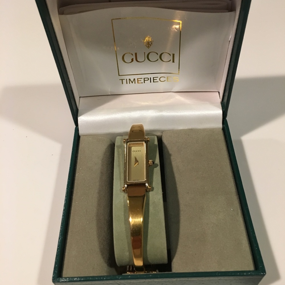 Gucci women's 14k gold plated bangle watch